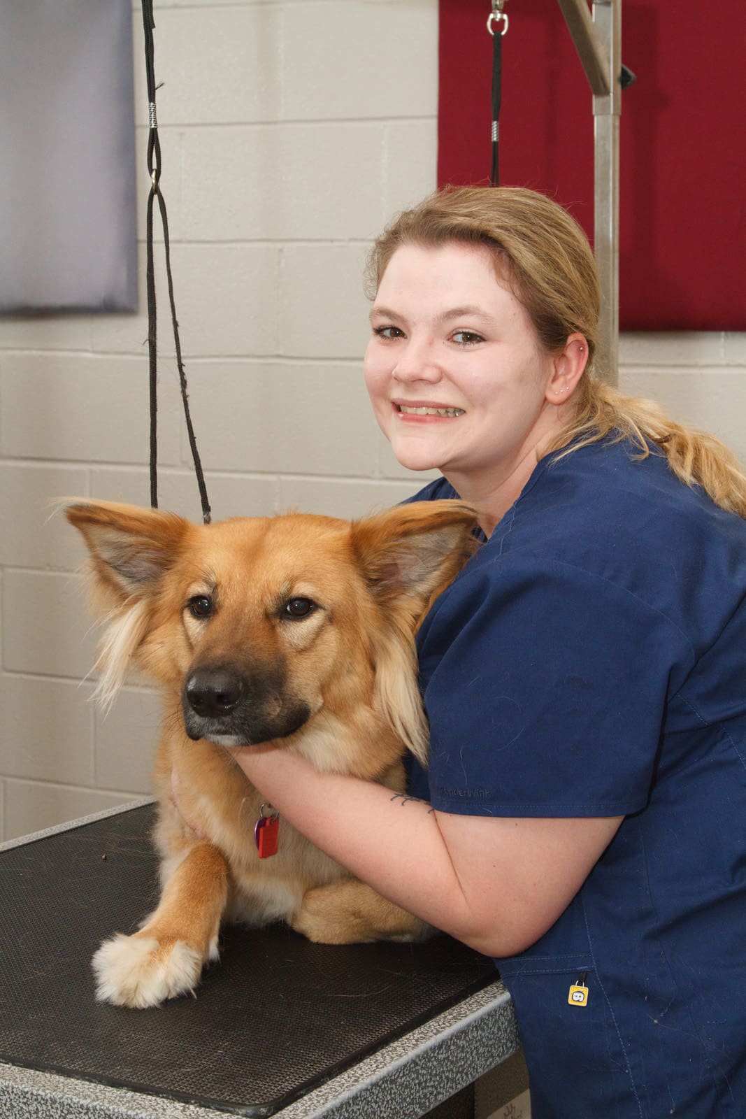 Big Creek Animal Hospital Vet Technician with a dog